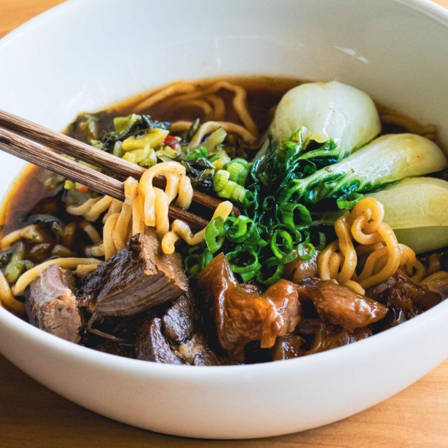 a bowl of noodles and meat